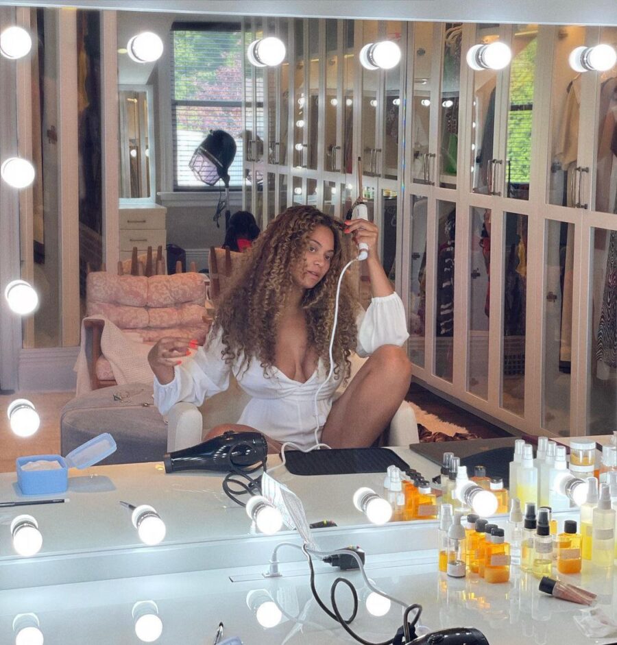 Beyonce doing her hair after skincare routine