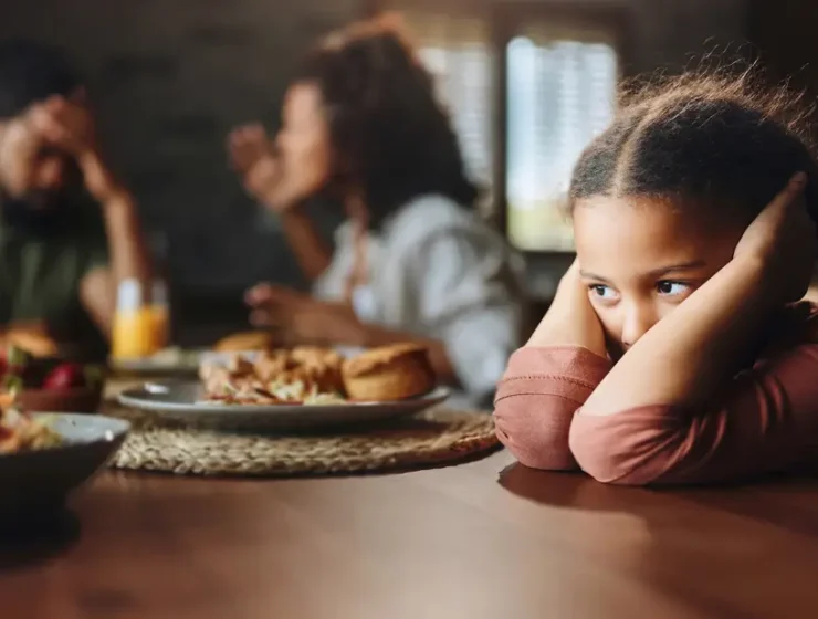 child-cowers-parents-argue