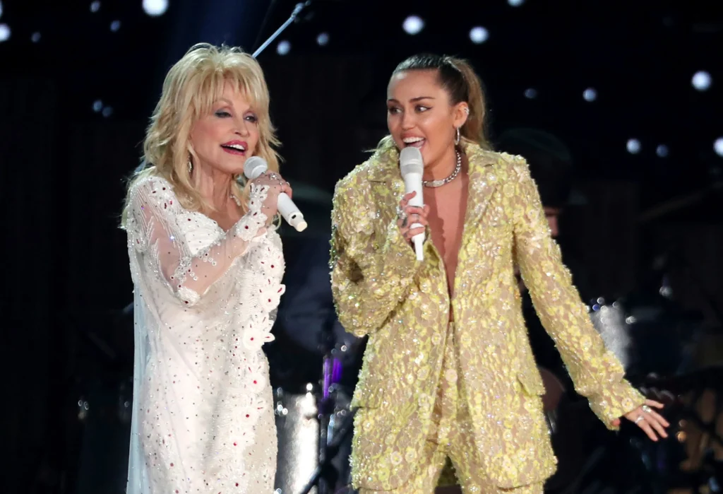 Dolly Parton, left, and Miley Cyrus perform “Jolene” at the 61st annual Grammy Awards in Los Angeles on Feb. 10, 2019