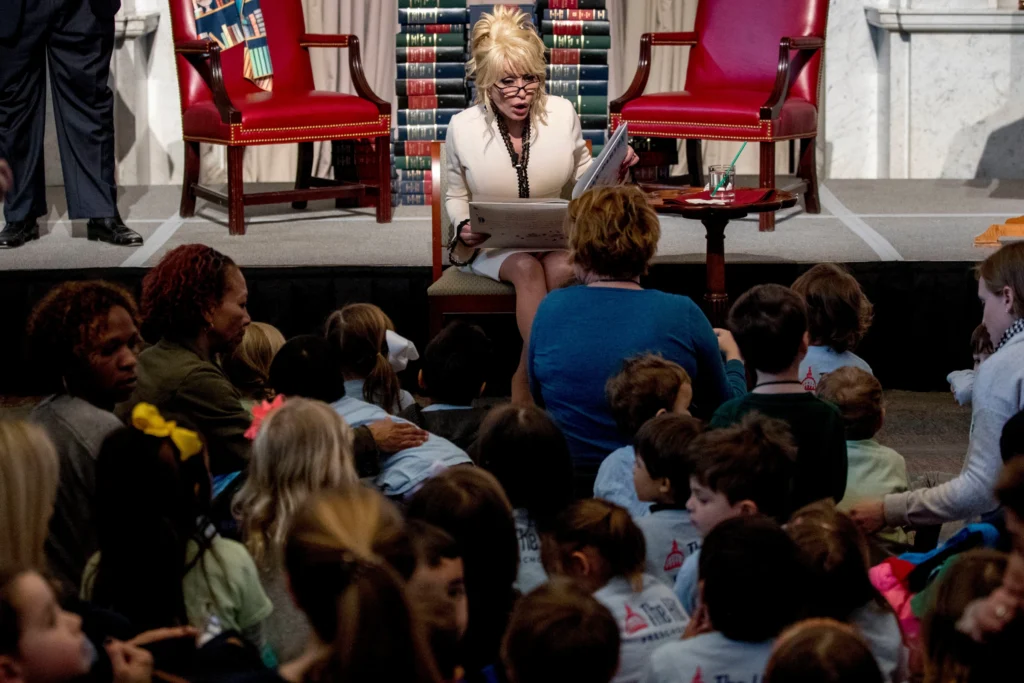 Dolly Parton reads her book “Coat of Many Colors,” at the Library of Congress in Washington on Feb. 27, 2018.